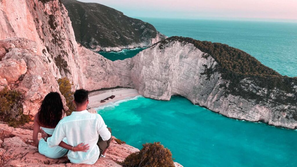 Couple overlooking the sea in Greece