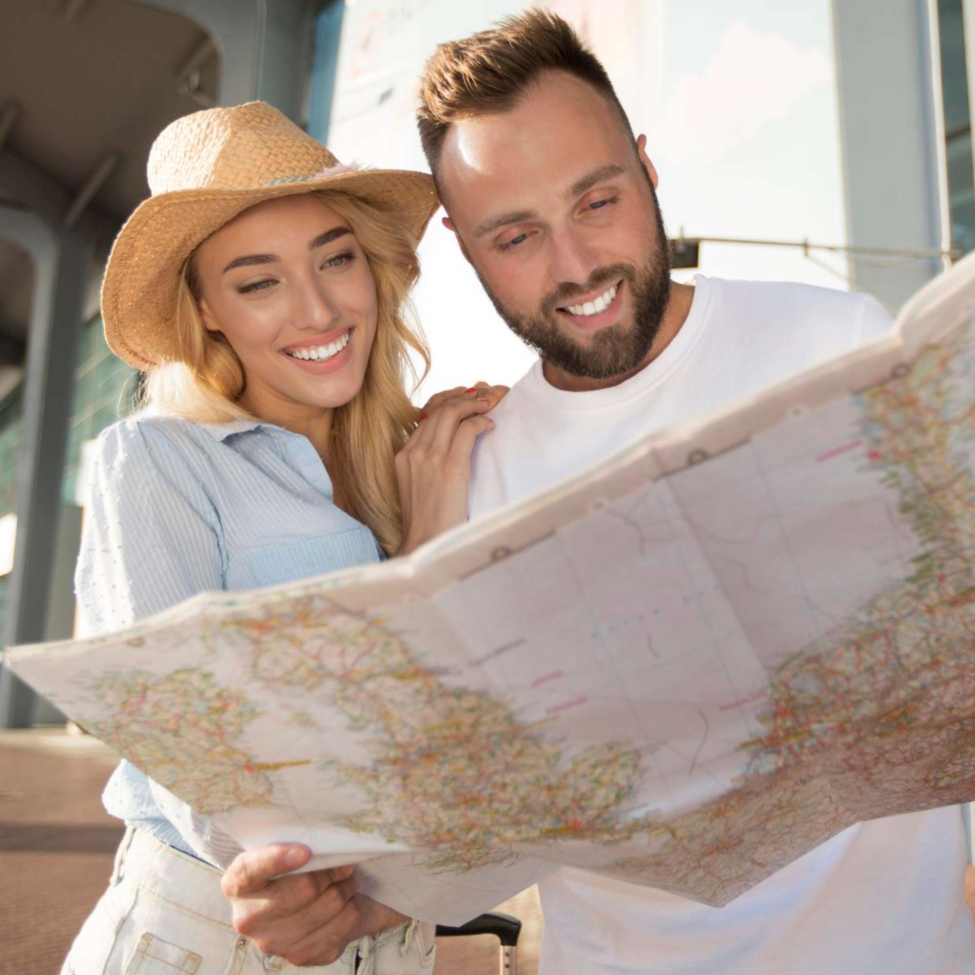 couple with map Greek island