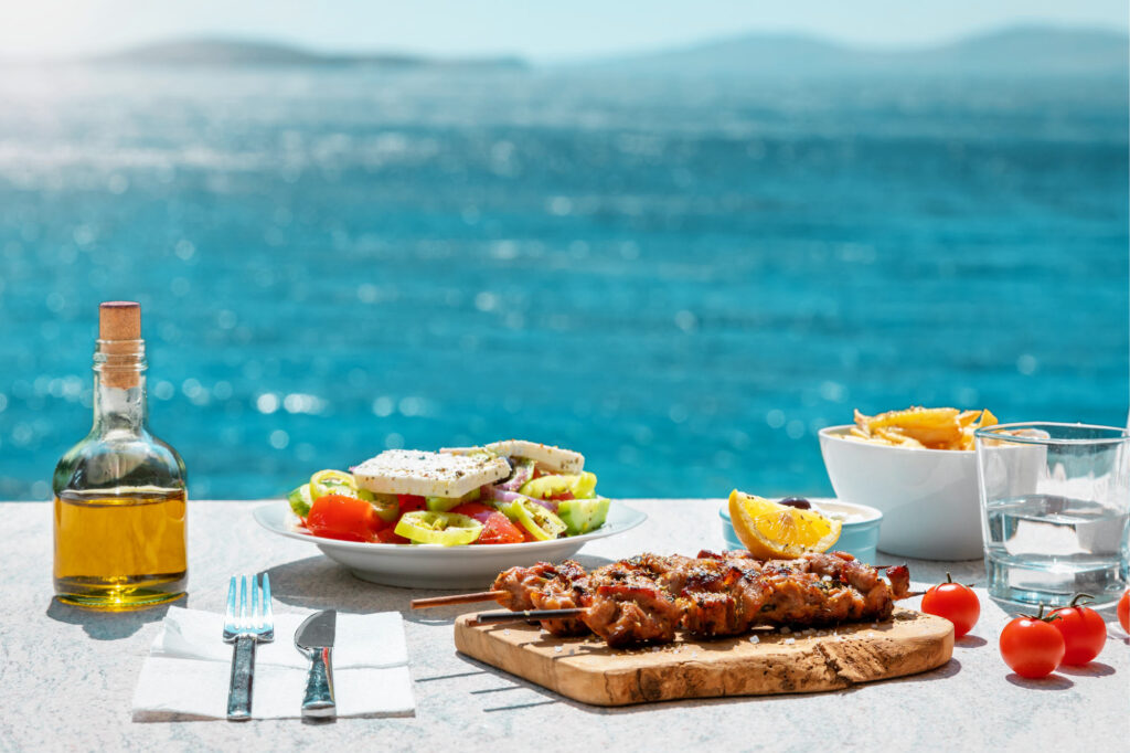 Romantic restaurant with Santorini caldera sunset views